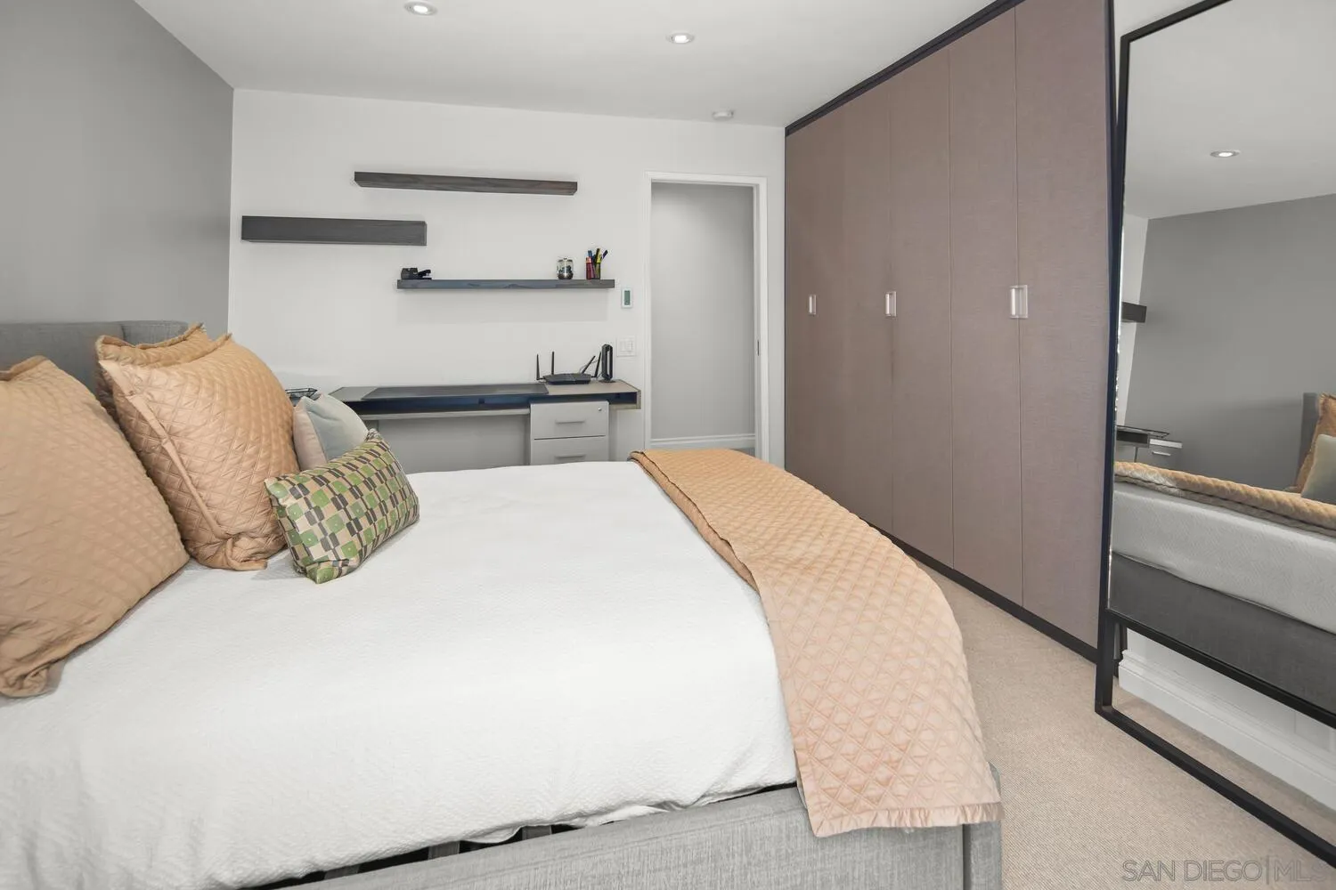 37 Antigua Court Coronado, CA 92118 - Photo 29 of 39 a bedroom with a bed and closet