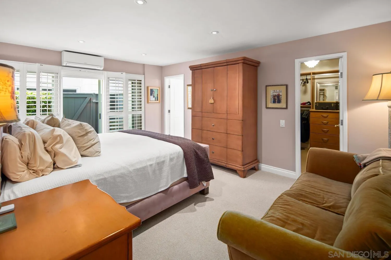 37 Antigua Court Coronado, CA 92118 - Photo 30 of 39 a bedroom with bed couch and window