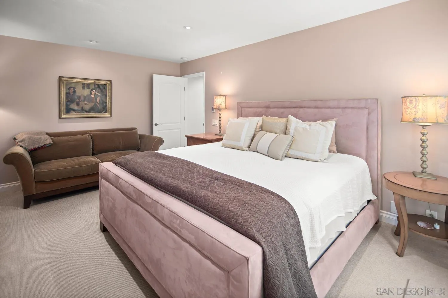 37 Antigua Court Coronado, CA 92118 - Photo 32 of 39 a bedroom with a bed couch and painting on the wall