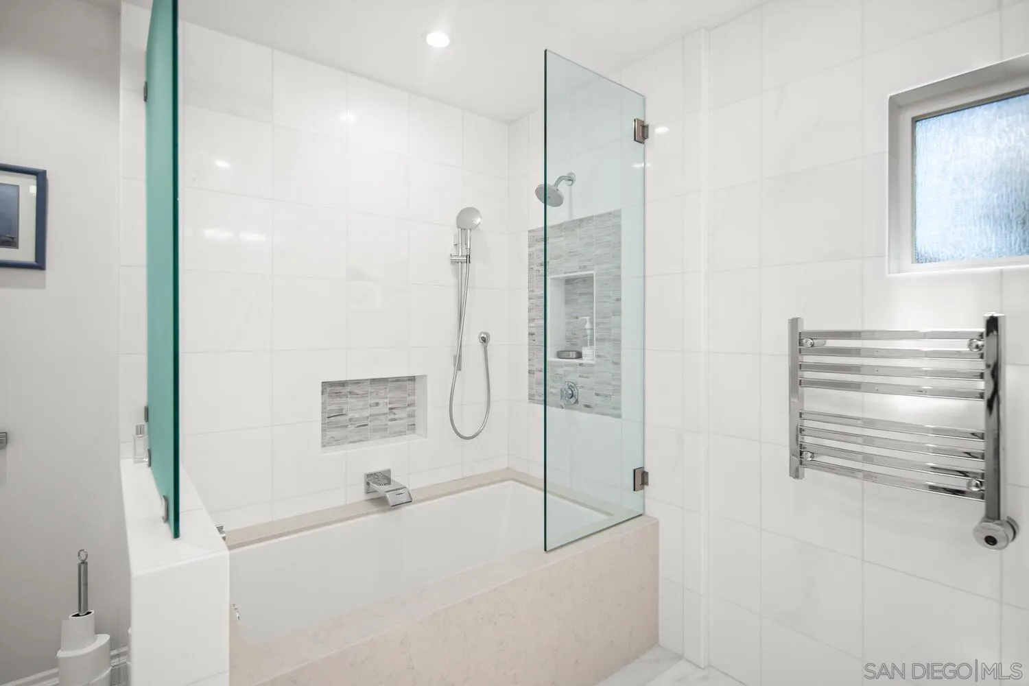 37 Antigua Court Coronado, CA 92118 - Photo 34 of 39 a bathroom with a bathtub and a shower