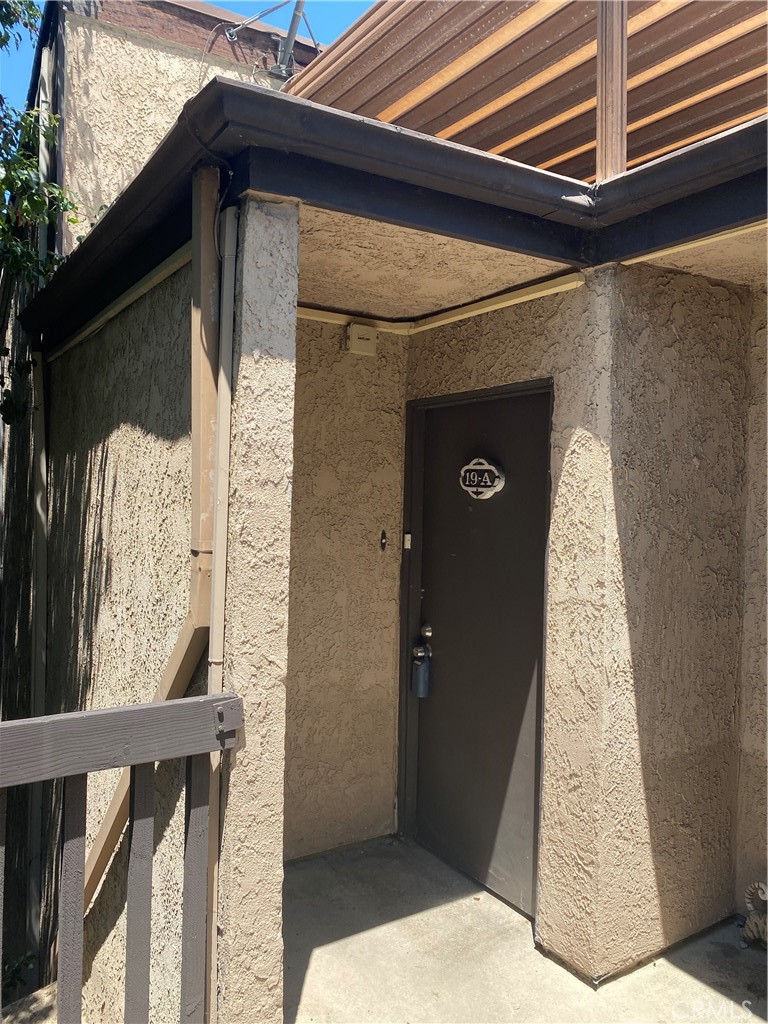 7890 East Spring Street, Unit 19A Long Beach, CA 90815 - Photo 2 of 24 a view of entryway