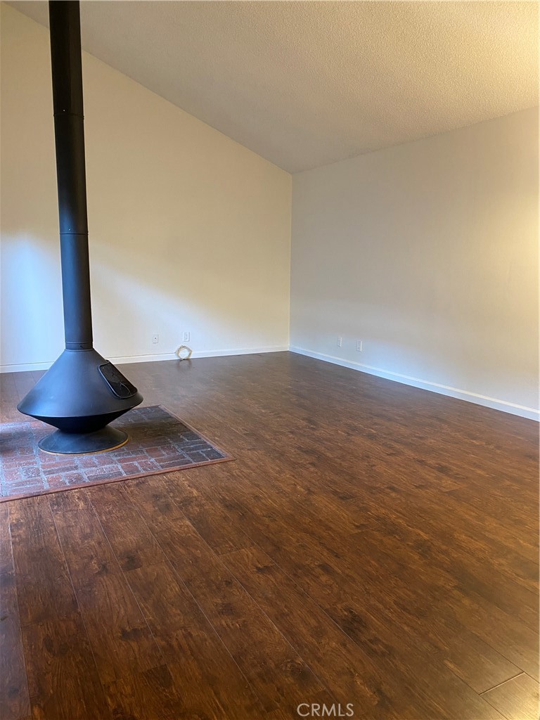 7890 East Spring Street, Unit 19A Long Beach, CA 90815 - Photo 4 of 24 a view of wooden floor
