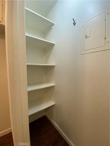 a view of cabinets and wooden floor