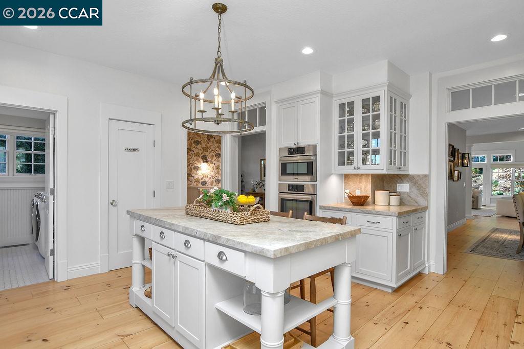 1751 Reliez Valley Road Lafayette, CA 94549 - Photo 13 of 60 a kitchen with stainless steel appliances granite countertop a stove oven and a refrigerator