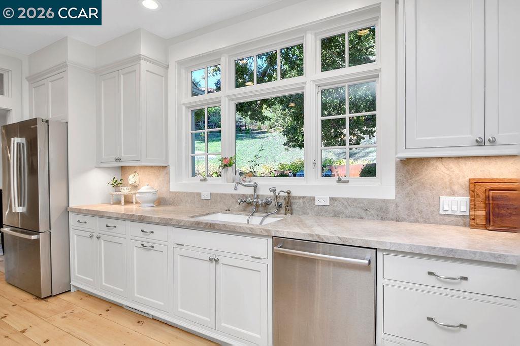 1751 Reliez Valley Road Lafayette, CA 94549 - Photo 14 of 60 a kitchen with appliances cabinets and a sink