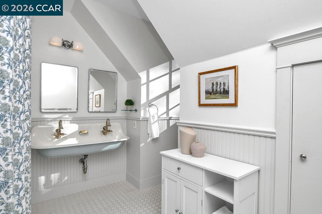 1751 Reliez Valley Road Lafayette, CA 94549 - Photo 21 of 60 a bathroom with a sink and a mirror