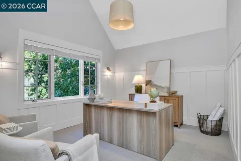 a view of a lake with a yard