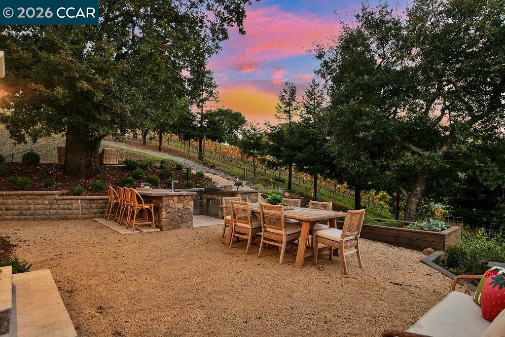 1751 Reliez Valley Road Lafayette, CA 94549 - Photo 29 of 60 a view of a chairs and table in backyard