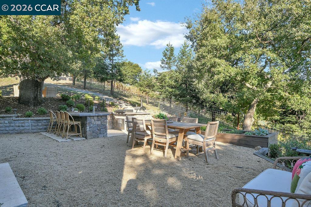 1751 Reliez Valley Road Lafayette, CA 94549 - Photo 30 of 60 a view of a tables and chairs in the patio