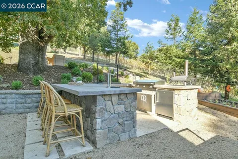 an aerial view of a house with a garden