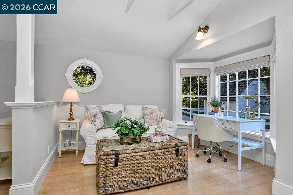 1751 Reliez Valley Road Lafayette, CA 94549 - Photo 43 of 60 a living room with furniture a table and a large window