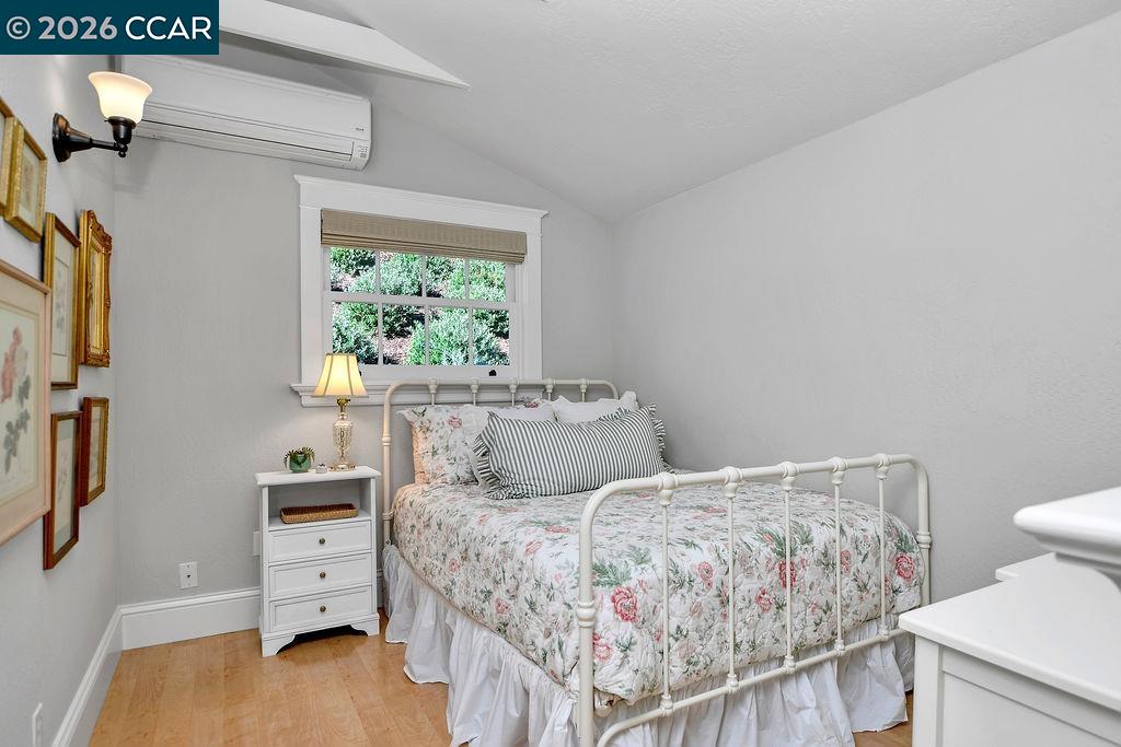 1751 Reliez Valley Road Lafayette, CA 94549 - Photo 48 of 60 a bed room with a bed and a tv