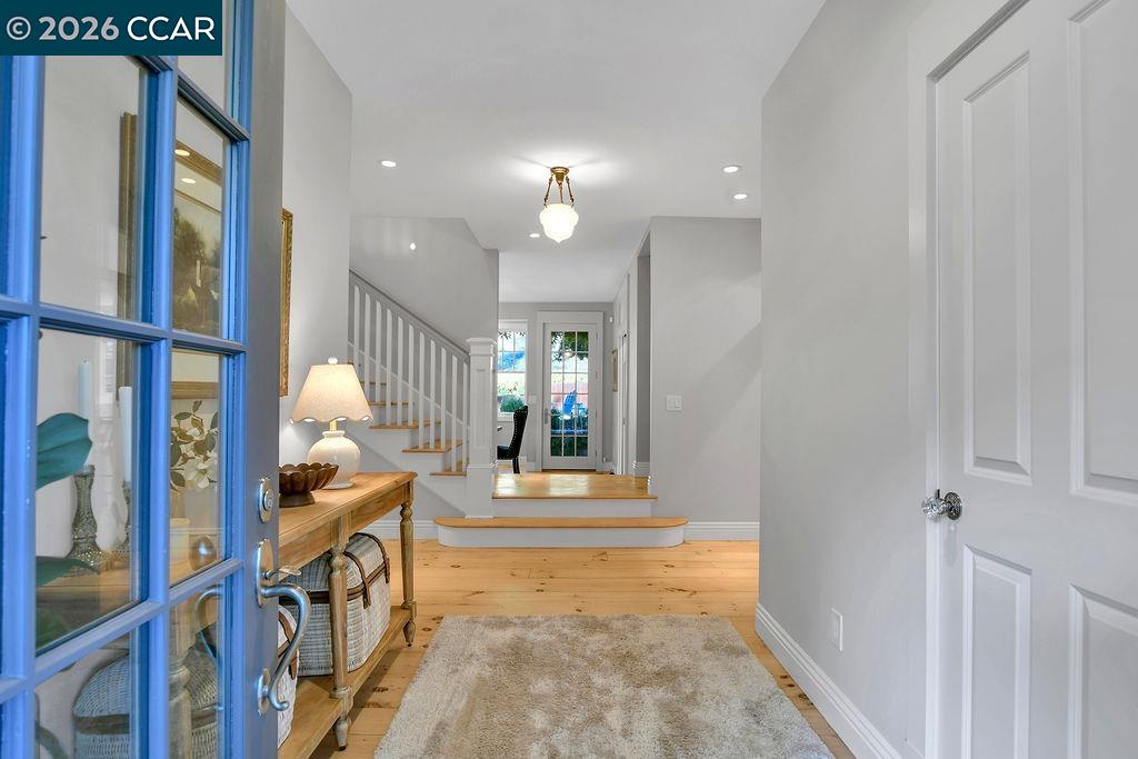 1751 Reliez Valley Road Lafayette, CA 94549 - Photo 5 of 60 a view of a hallway with wooden floor and entryway
