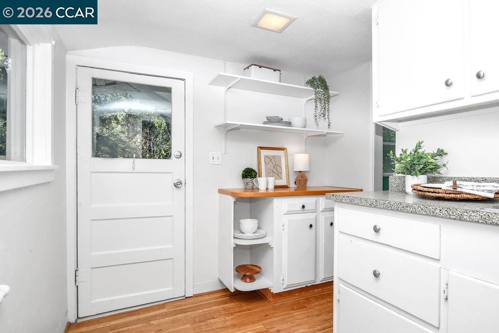 1751 Reliez Valley Road Lafayette, CA 94549 - Photo 58 of 60 a kitchen with a sink and wooden floor