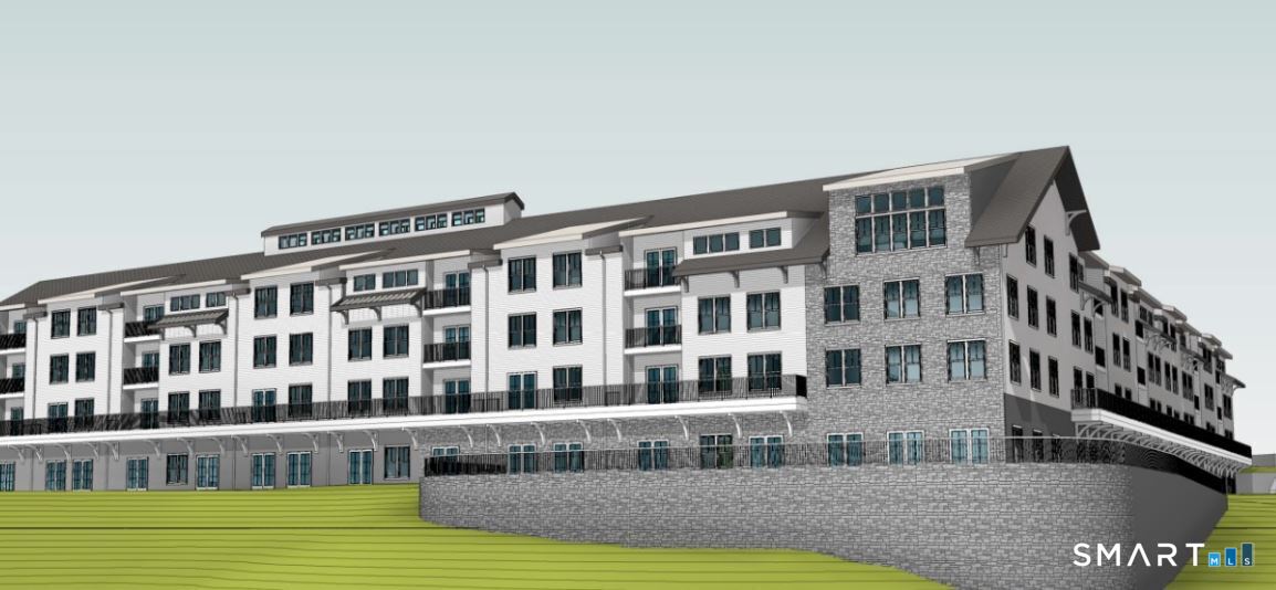 a view of front of building with yard