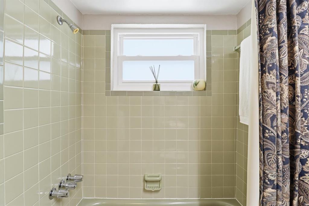 7410 Gulf Highlands Drive Port Richey, FL 34668 - Photo 28 of 45 a bathroom with a shower