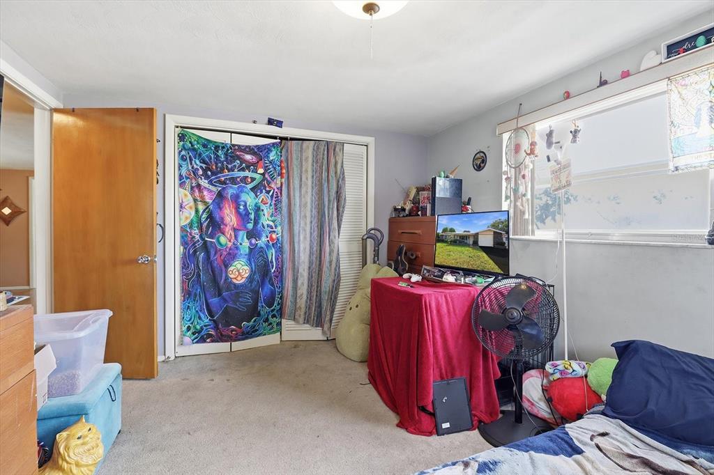 7410 Gulf Highlands Drive Port Richey, FL 34668 - Photo 30 of 45 a living room with furniture