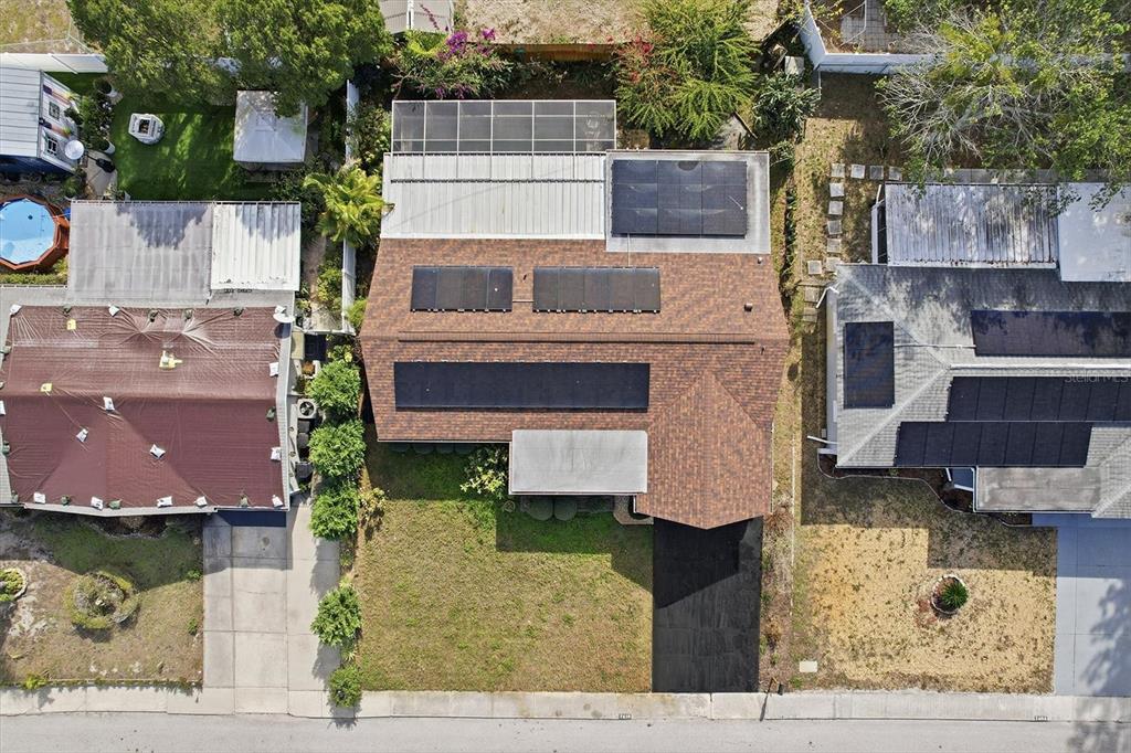 7410 Gulf Highlands Drive Port Richey, FL 34668 - Photo 41 of 45 a front view of a house with a yard
