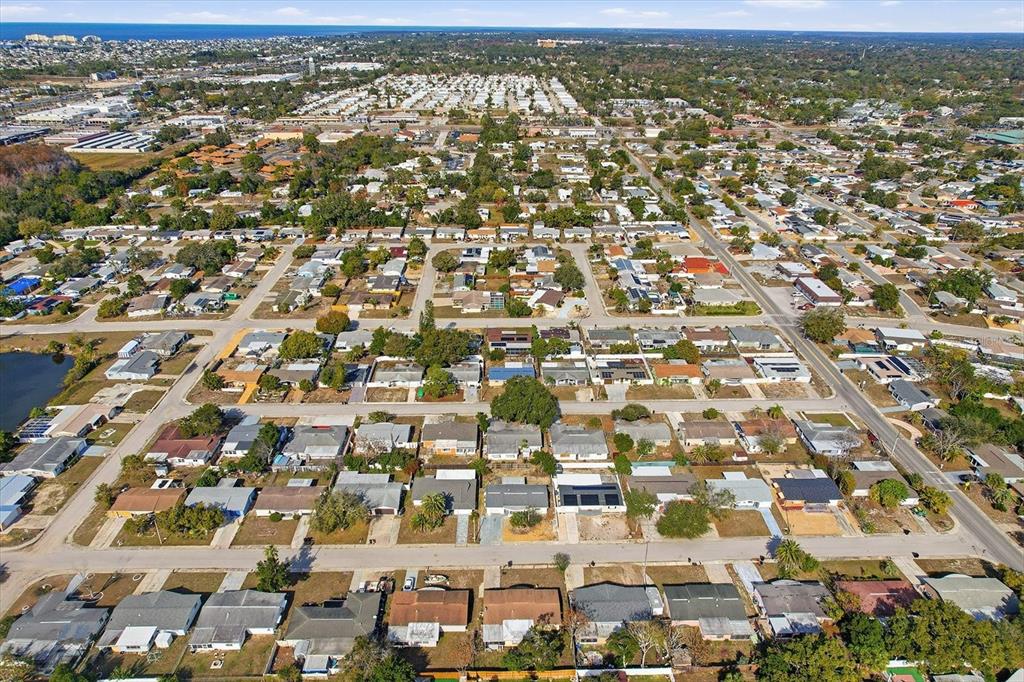 7410 Gulf Highlands Drive Port Richey, FL 34668 - Photo 44 of 45 an aerial view of residential building with parking space