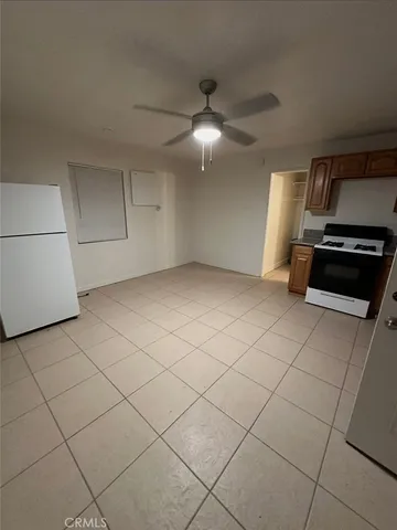 a view of a livingroom with wooden floor