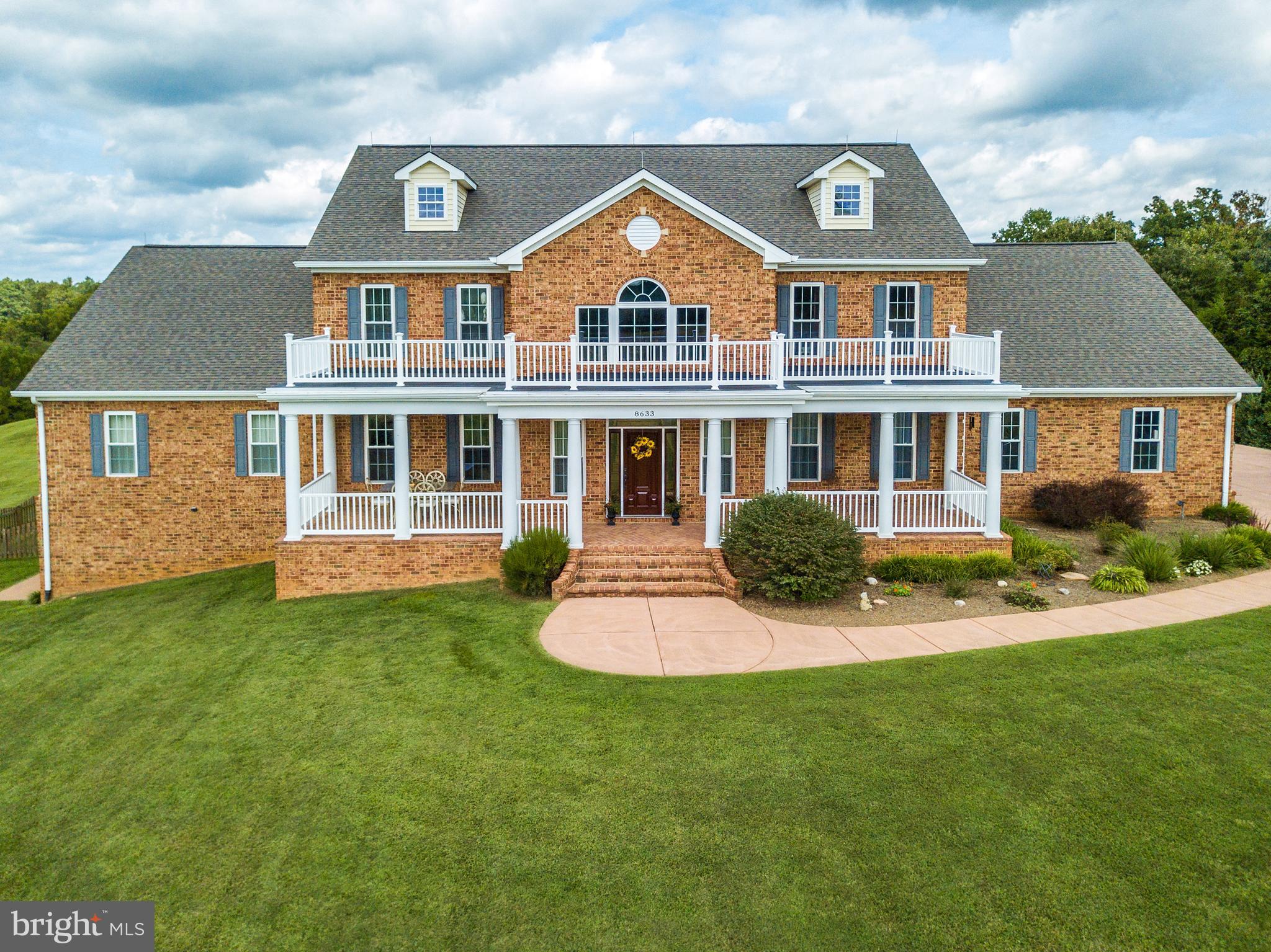 8633 Shepherds Way Rixeyville, VA 22737 - Photo 1 of 48 a front view of a house with a yard