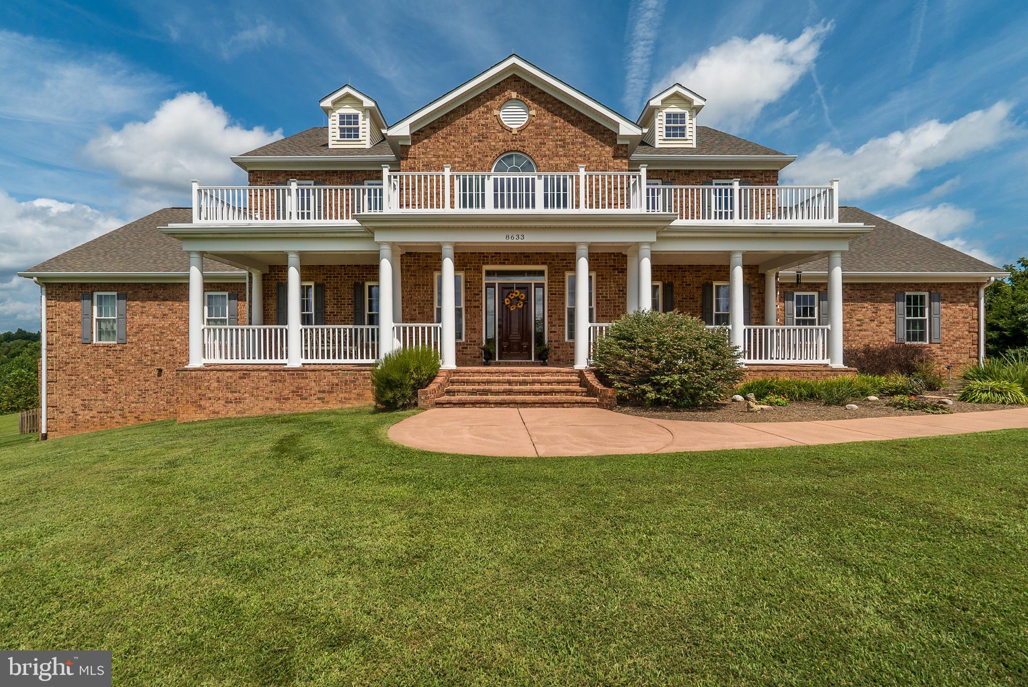 8633 Shepherds Way Rixeyville, VA 22737 - Photo 2 of 48 a front view of a house with yard and green space