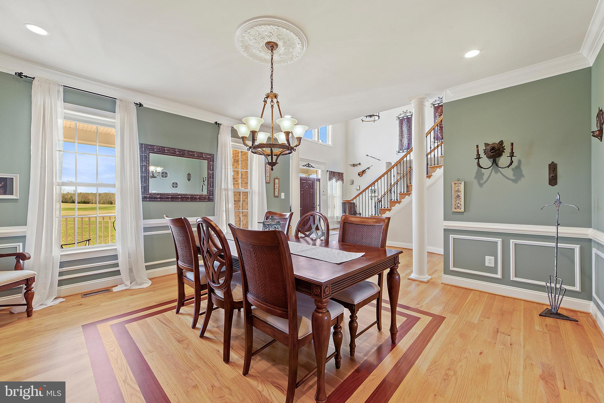 8633 Shepherds Way Rixeyville, VA 22737 - Photo 14 of 48 a view of a dining room with furniture window and wooden floor