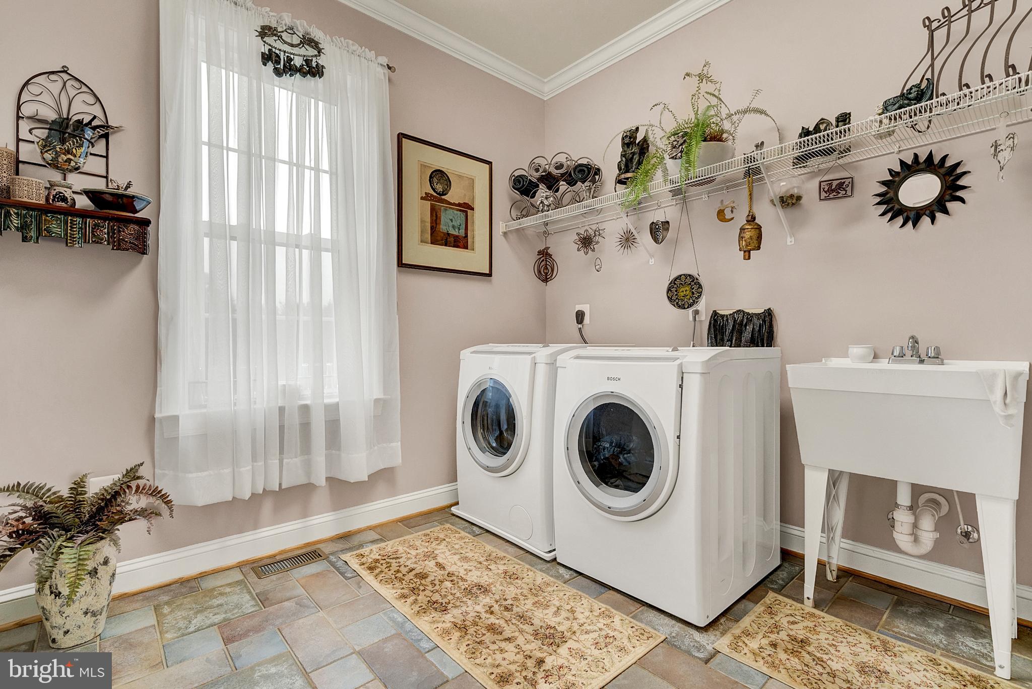 8633 Shepherds Way Rixeyville, VA 22737 - Photo 20 of 48 a utility room with dryer and washer