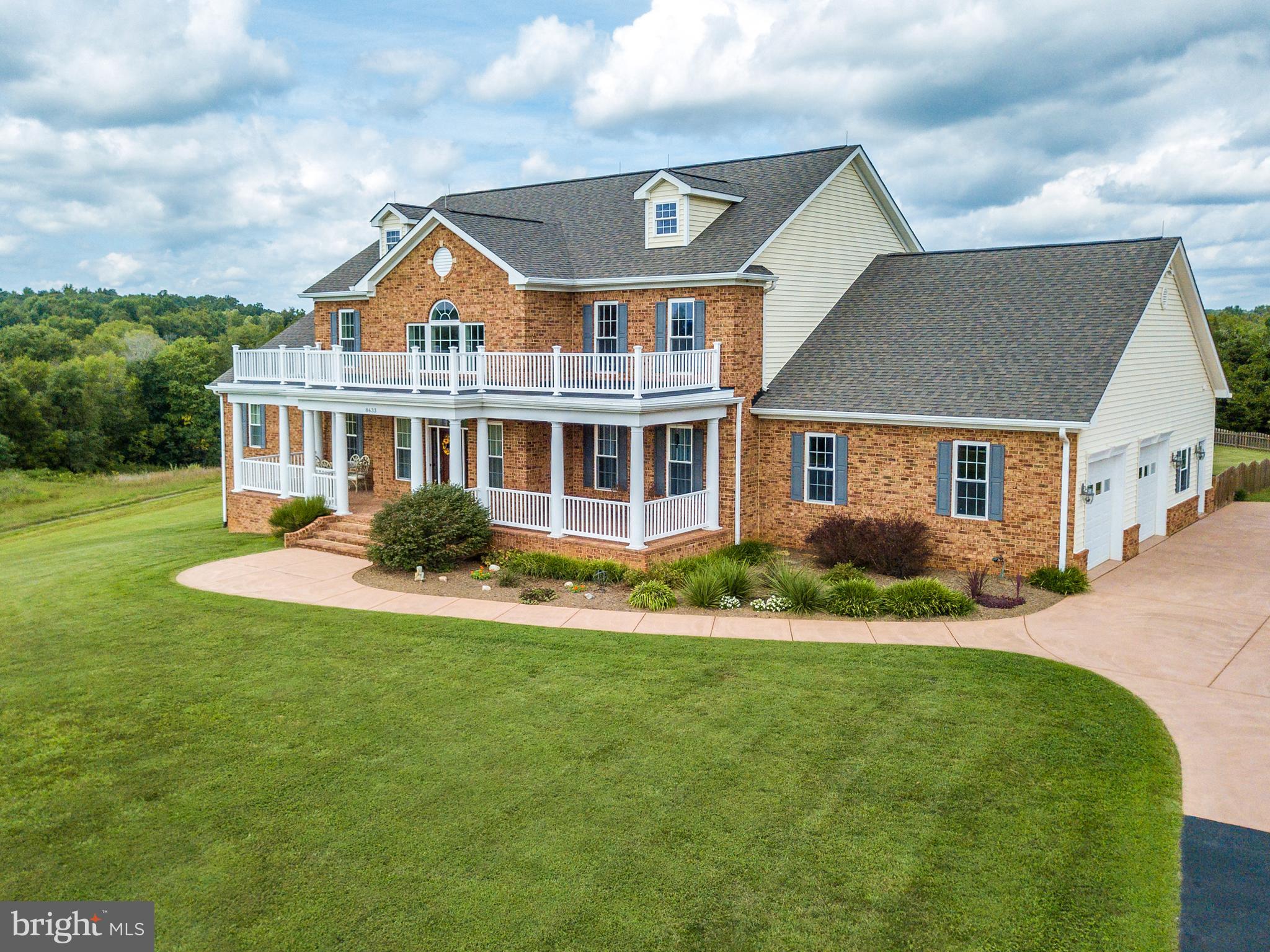 8633 Shepherds Way Rixeyville, VA 22737 - Photo 3 of 48 a front view of a house with a yard