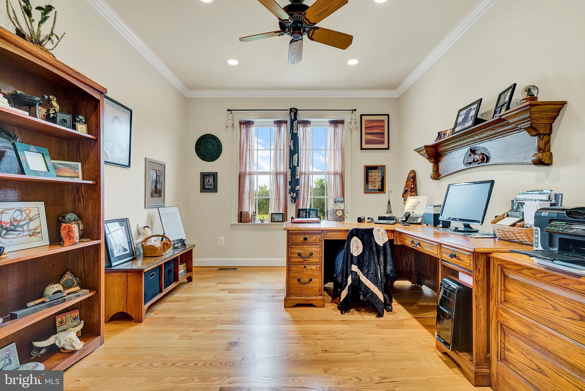 8633 Shepherds Way Rixeyville, VA 22737 - Photo 24 of 48 a view of a workspace with furniture and a book shelf