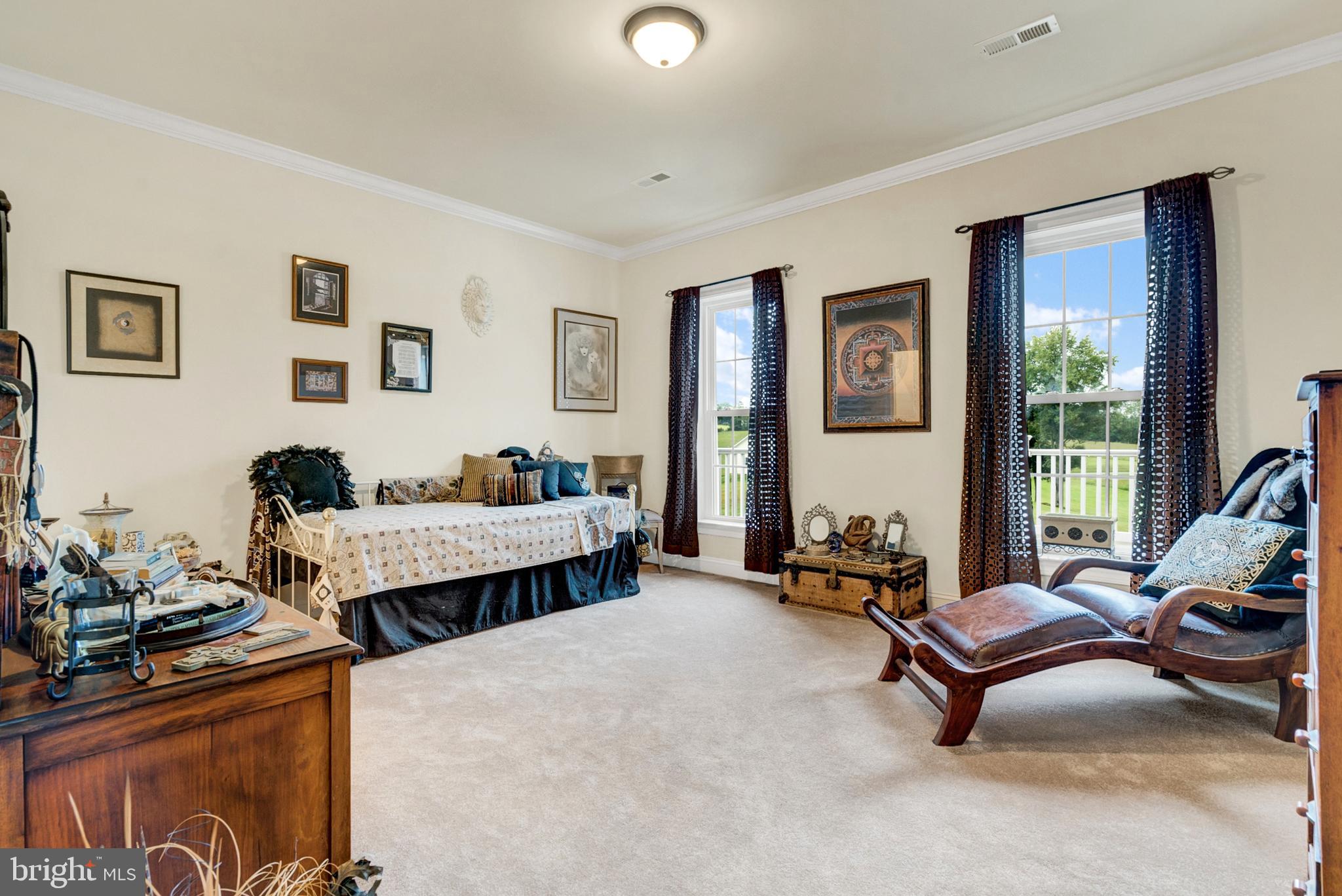 8633 Shepherds Way Rixeyville, VA 22737 - Photo 29 of 48 a bedroom with furniture and a large window