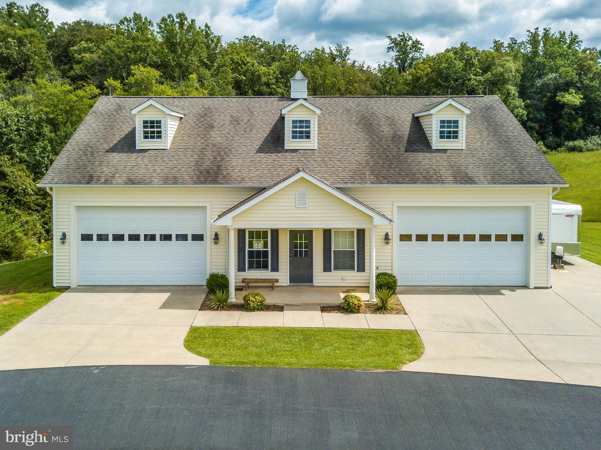 8633 Shepherds Way Rixeyville, VA 22737 - Photo 32 of 48 a front view of a house with a yard