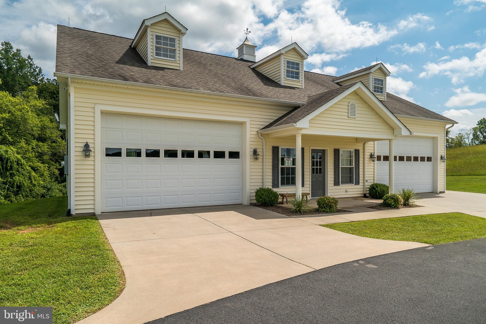 8633 Shepherds Way Rixeyville, VA 22737 - Photo 33 of 48 a front view of a house with a yard and garage