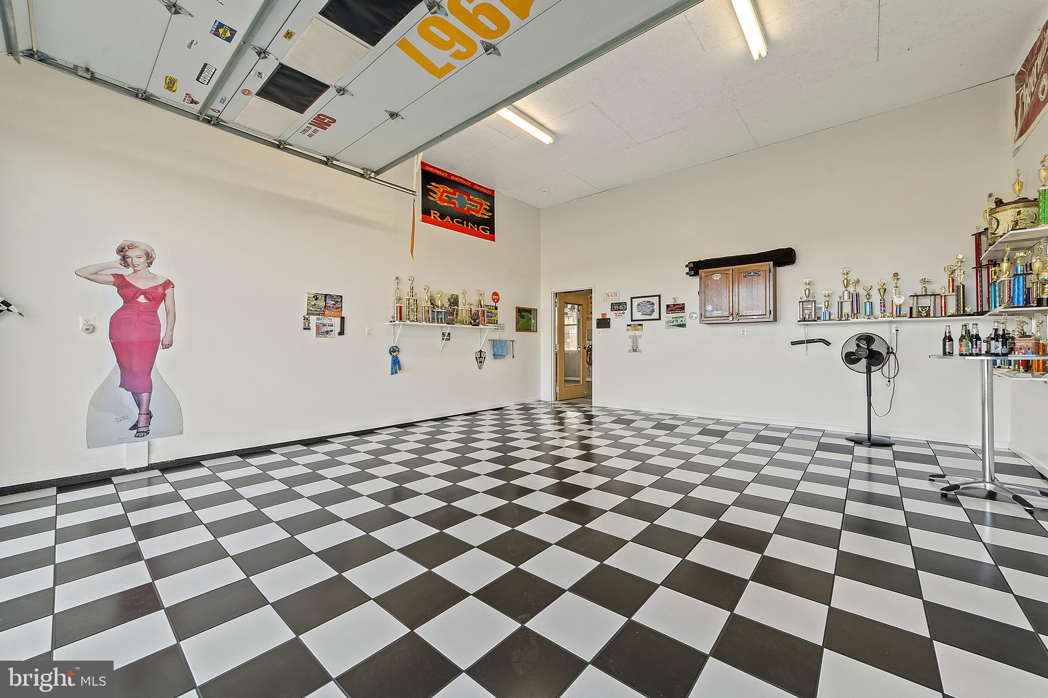 8633 Shepherds Way Rixeyville, VA 22737 - Photo 35 of 48 a black and white checkered floor