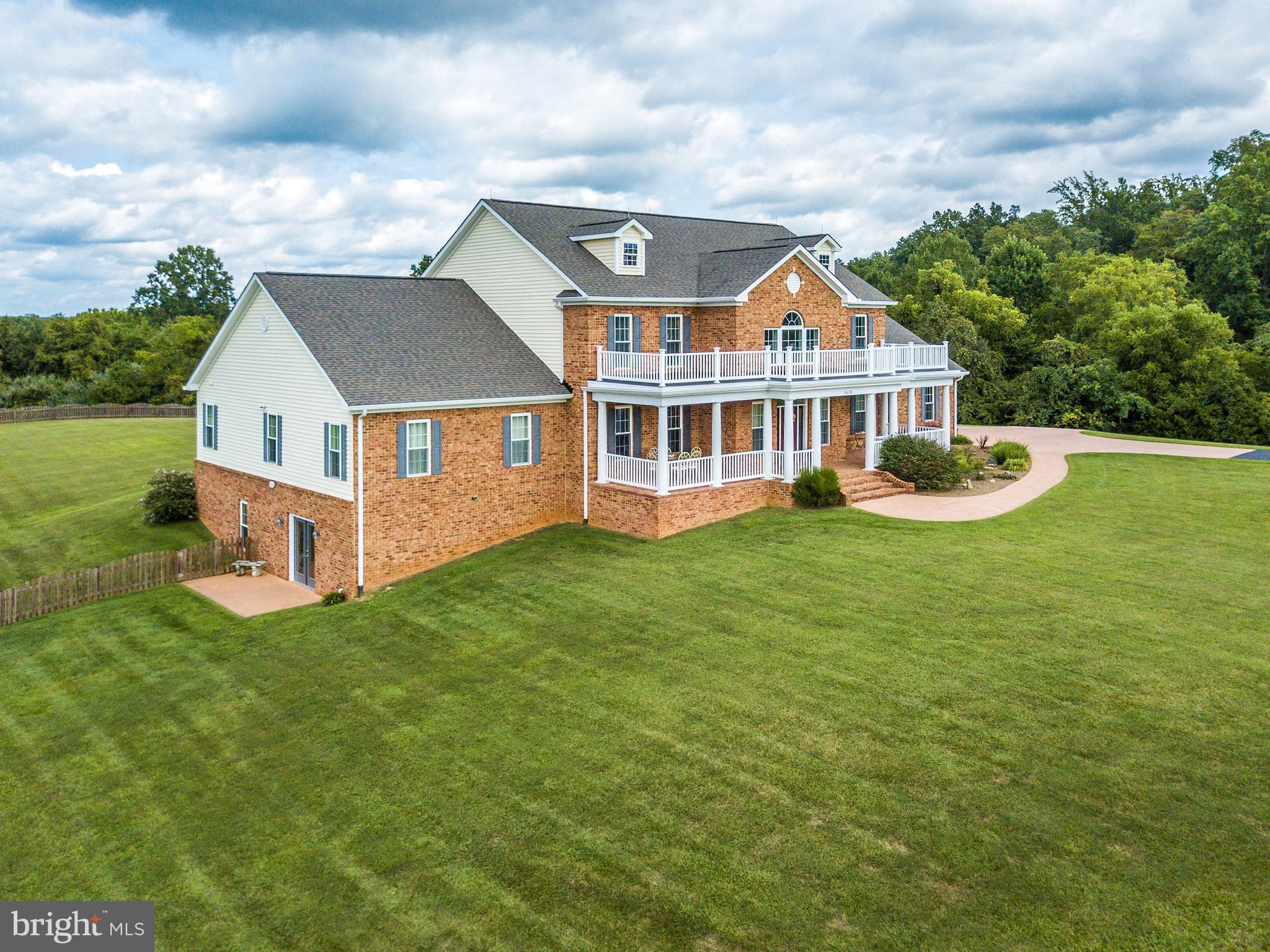8633 Shepherds Way Rixeyville, VA 22737 - Photo 37 of 48 a aerial view of a house with a big yard and large trees