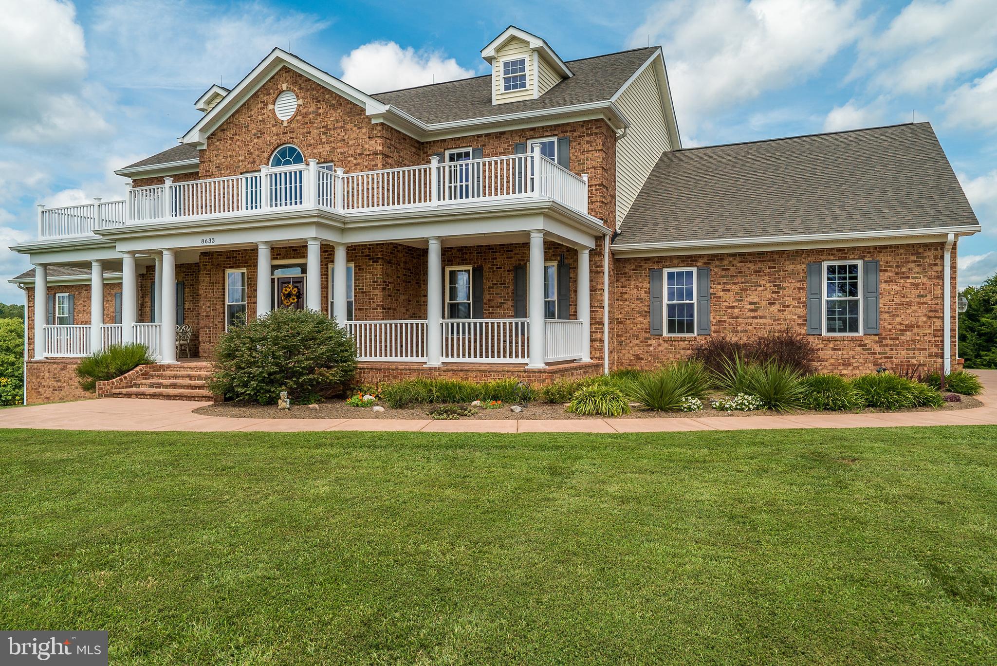 8633 Shepherds Way Rixeyville, VA 22737 - Photo 5 of 48 a front view of a house with a yard
