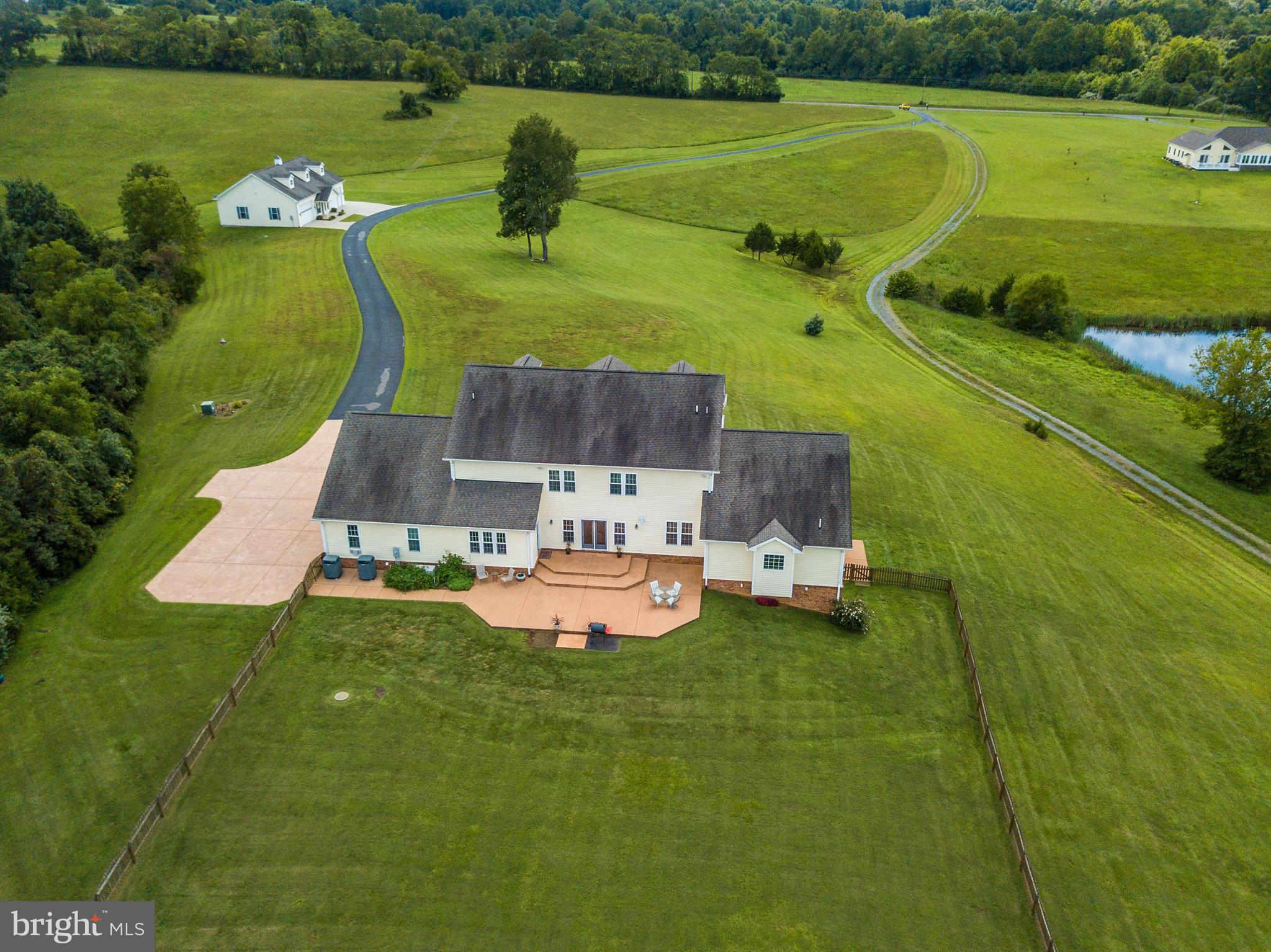 8633 Shepherds Way Rixeyville, VA 22737 - Photo 45 of 48 an aerial view of a house with a garden