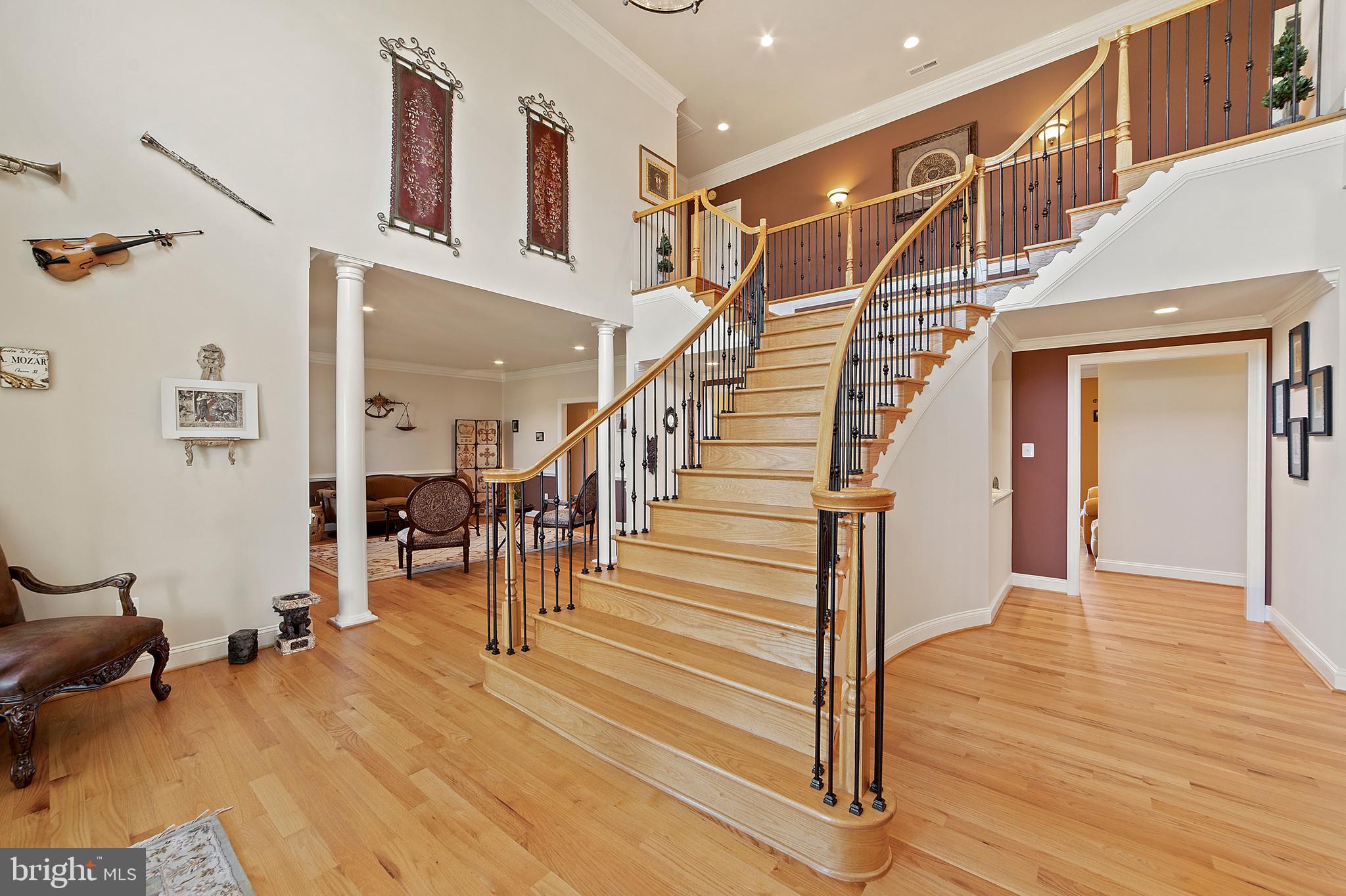 8633 Shepherds Way Rixeyville, VA 22737 - Photo 8 of 48 a view of entryway and hall with wooden floor