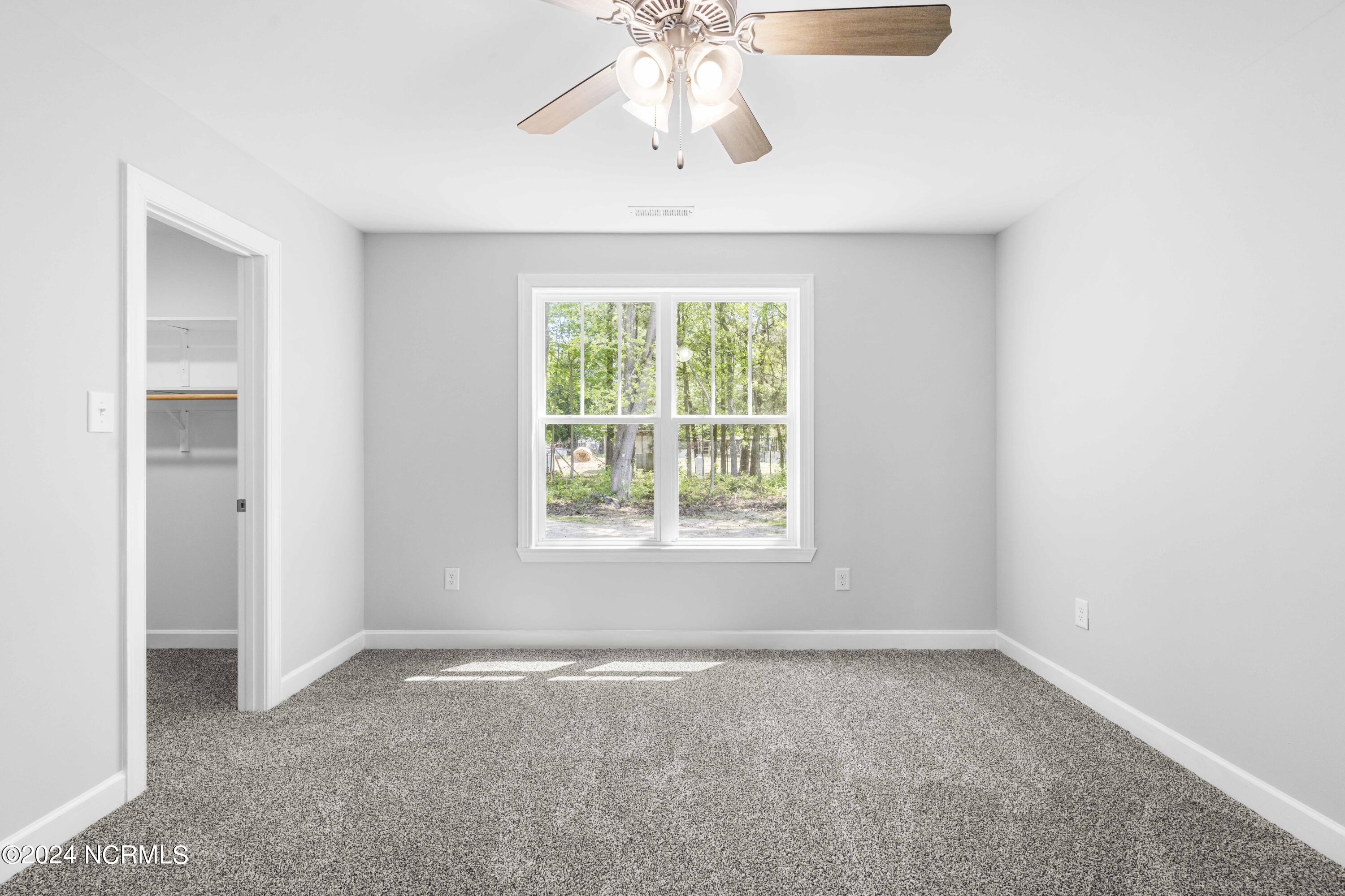 291 Wiggs Road Selma, NC 27576 - Photo 15 of 20 Second Bedroom