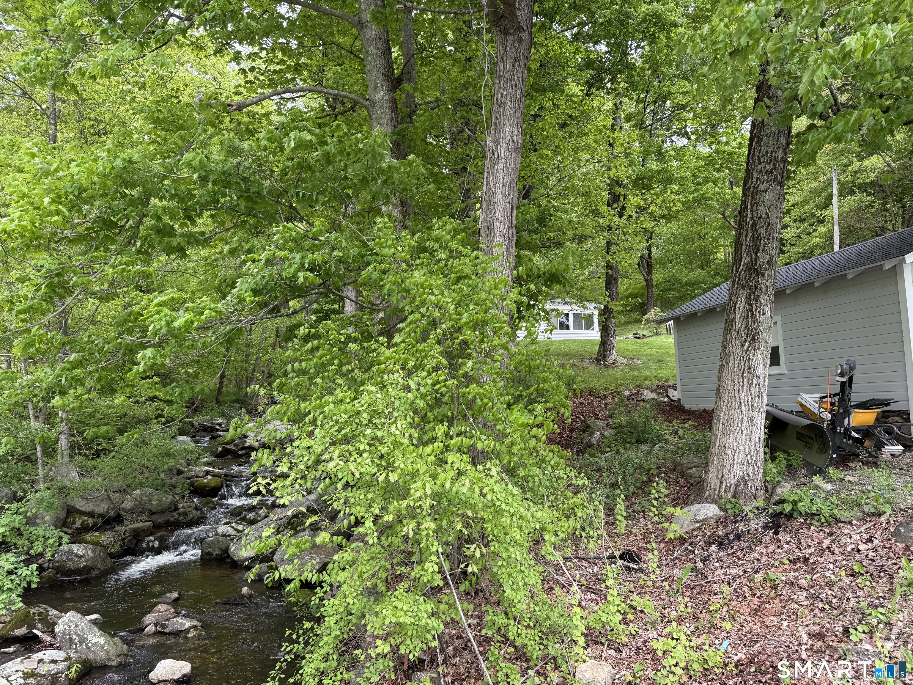277 Lake Road Andover, CT 06232 - Photo 3 of 18 a view of a back yard