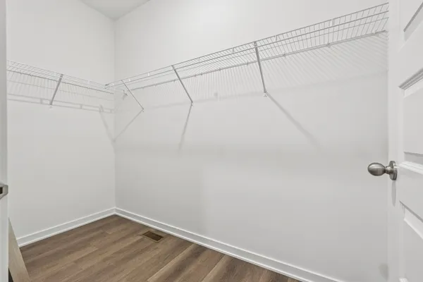 a view of a room with racks on the wall