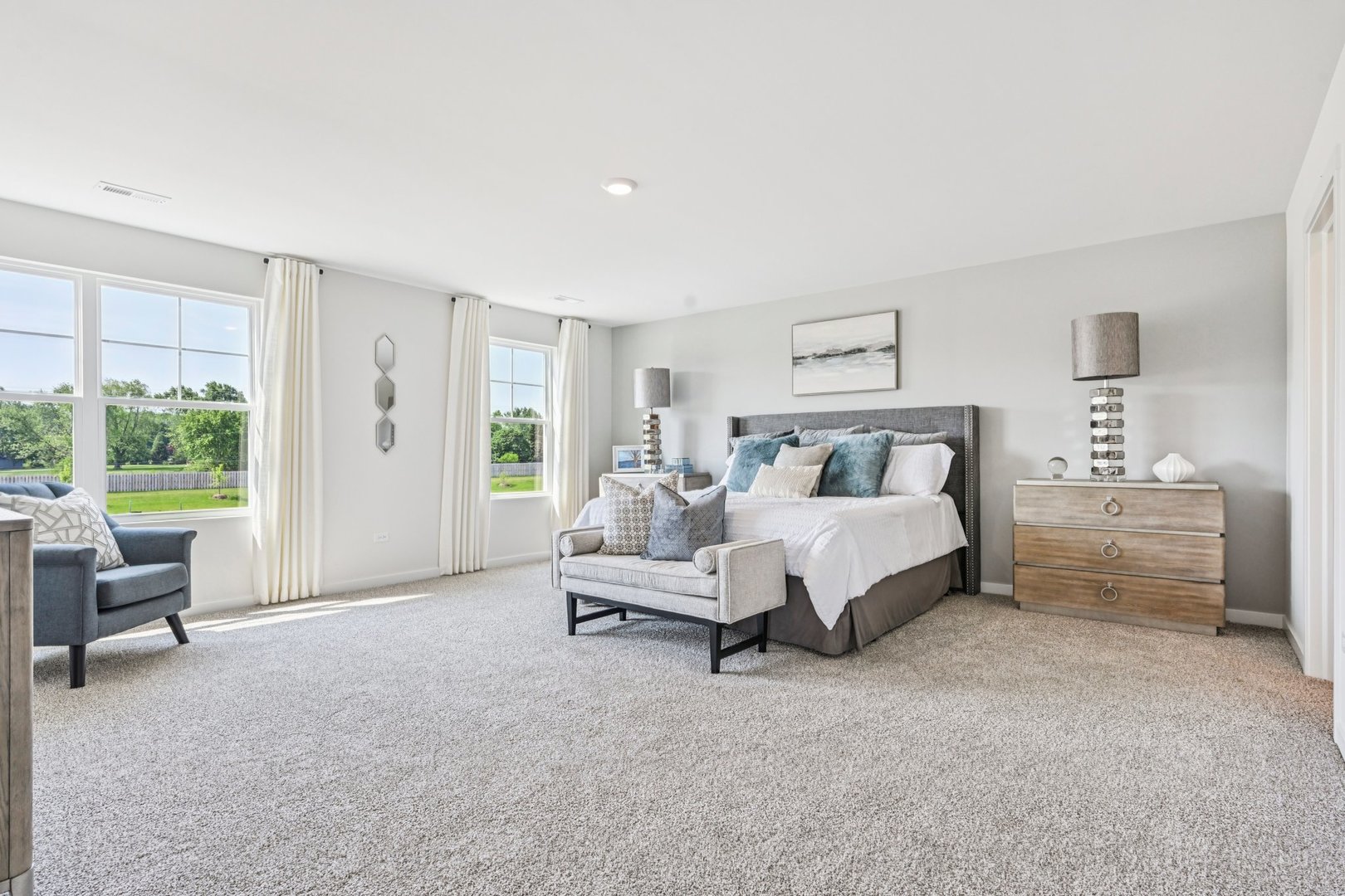 282 Snowdrop Lane Elgin, IL 60124 - Photo 27 of 54 a spacious bedroom with a bed and a couch