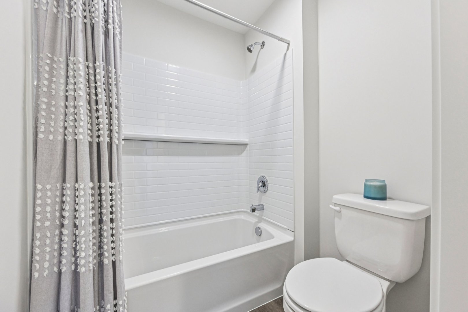 282 Snowdrop Lane Elgin, IL 60124 - Photo 40 of 54 a white toilet sitting next to a bath tub