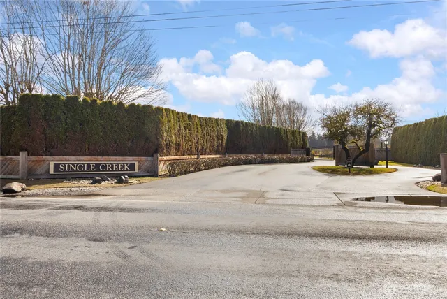 a view of swimming pool and a yard