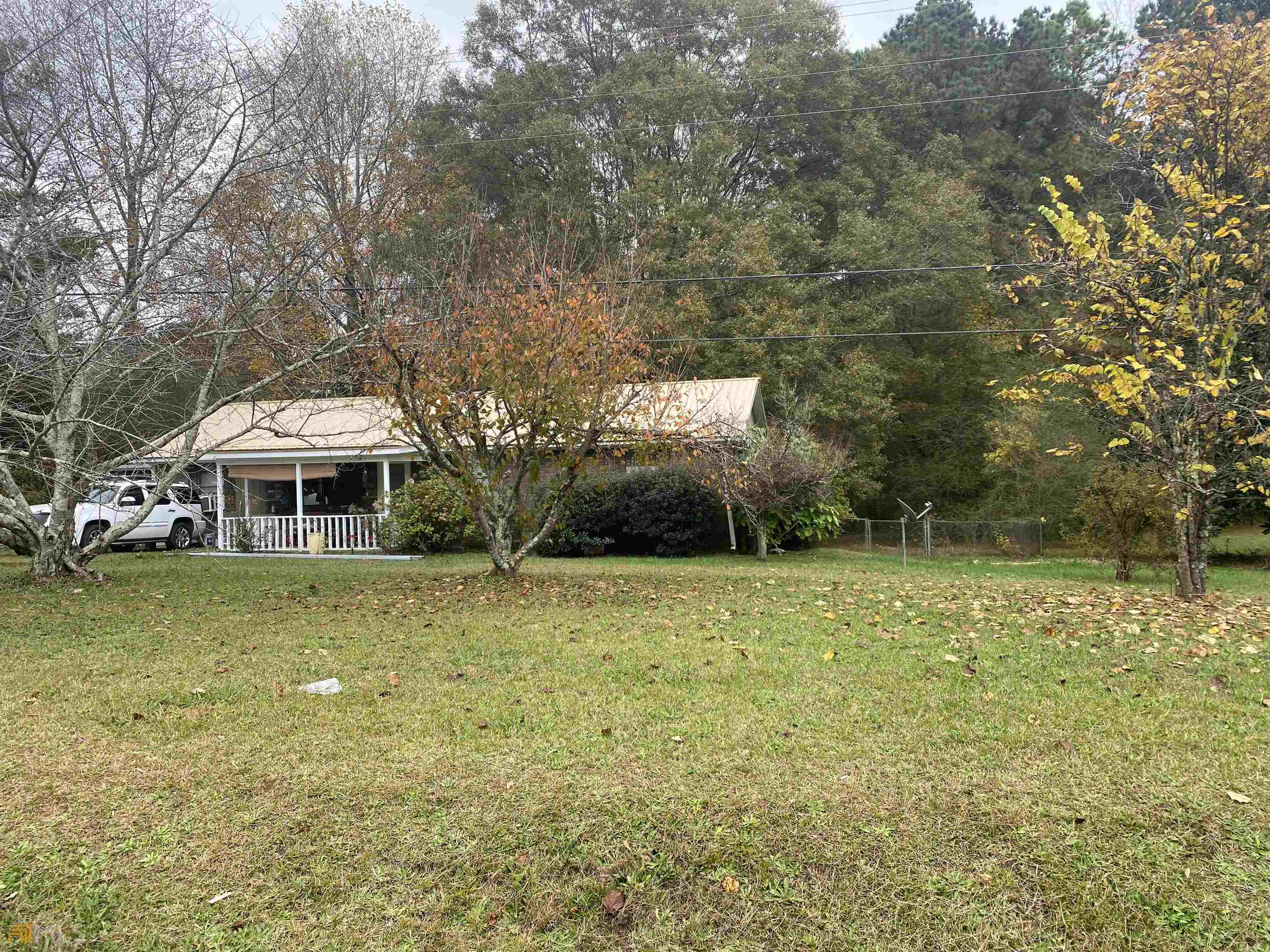 182 Bar J Road Temple, GA 30179 - Photo 1 of 1 a front view of a house with a yard