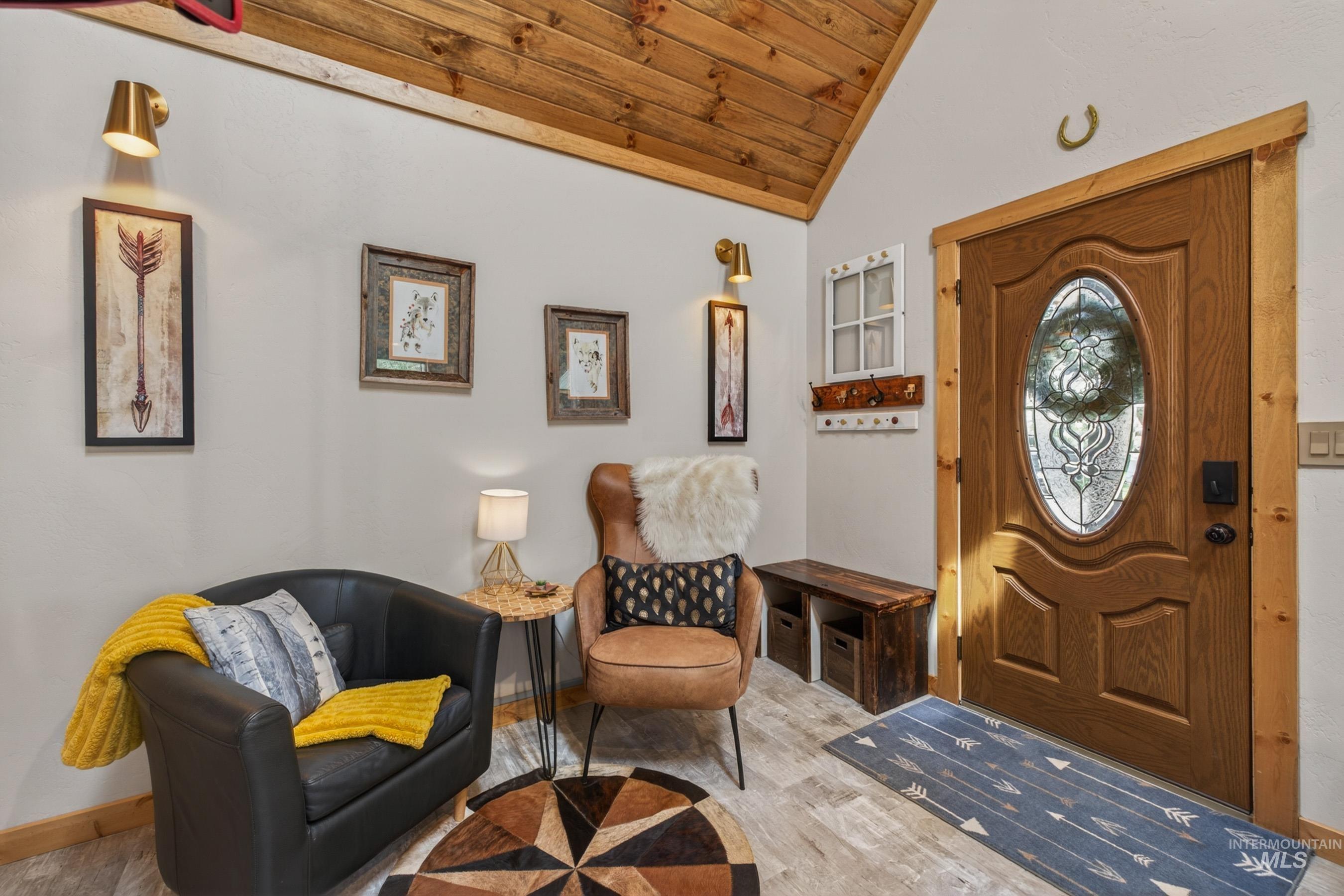 1432 Salmon Drive Riggins, ID 83549 - Photo 6 of 39 Entryway featuring a wood-panel accent ceiling and light wood-finish flooring