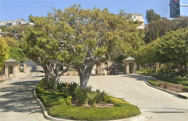 a backyard of a house with yard and outdoor seating