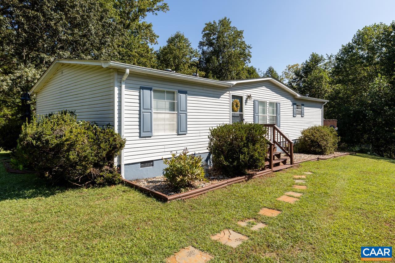 5000 Wheelers Cove Road Shipman, VA 22971 - Photo 3 of 45 a view of a house with backyard and garden