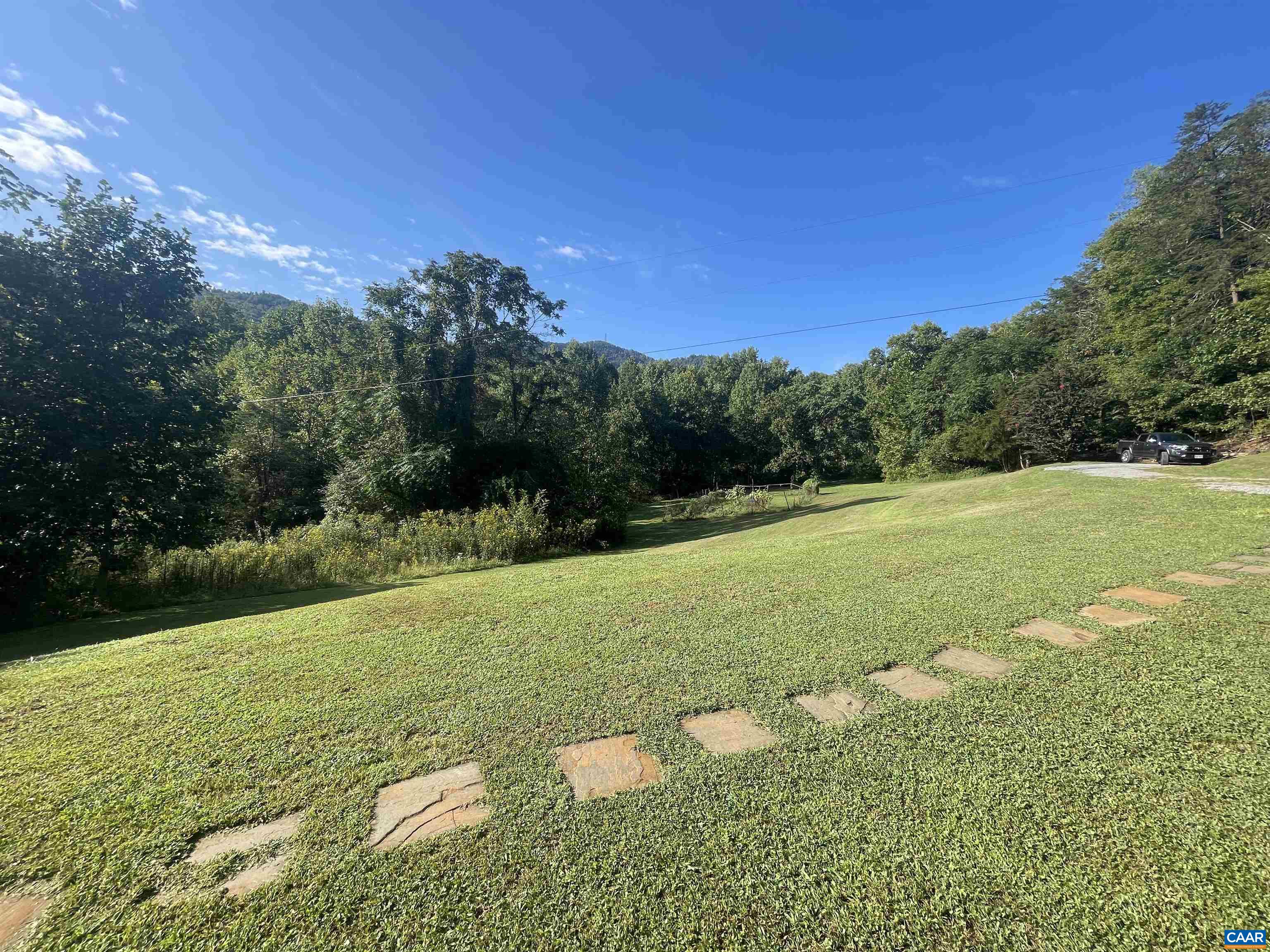 5000 Wheelers Cove Road Shipman, VA 22971 - Photo 8 of 45 a view of a field with an trees
