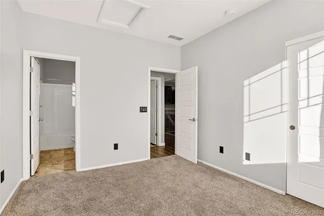 a view of an empty room with window